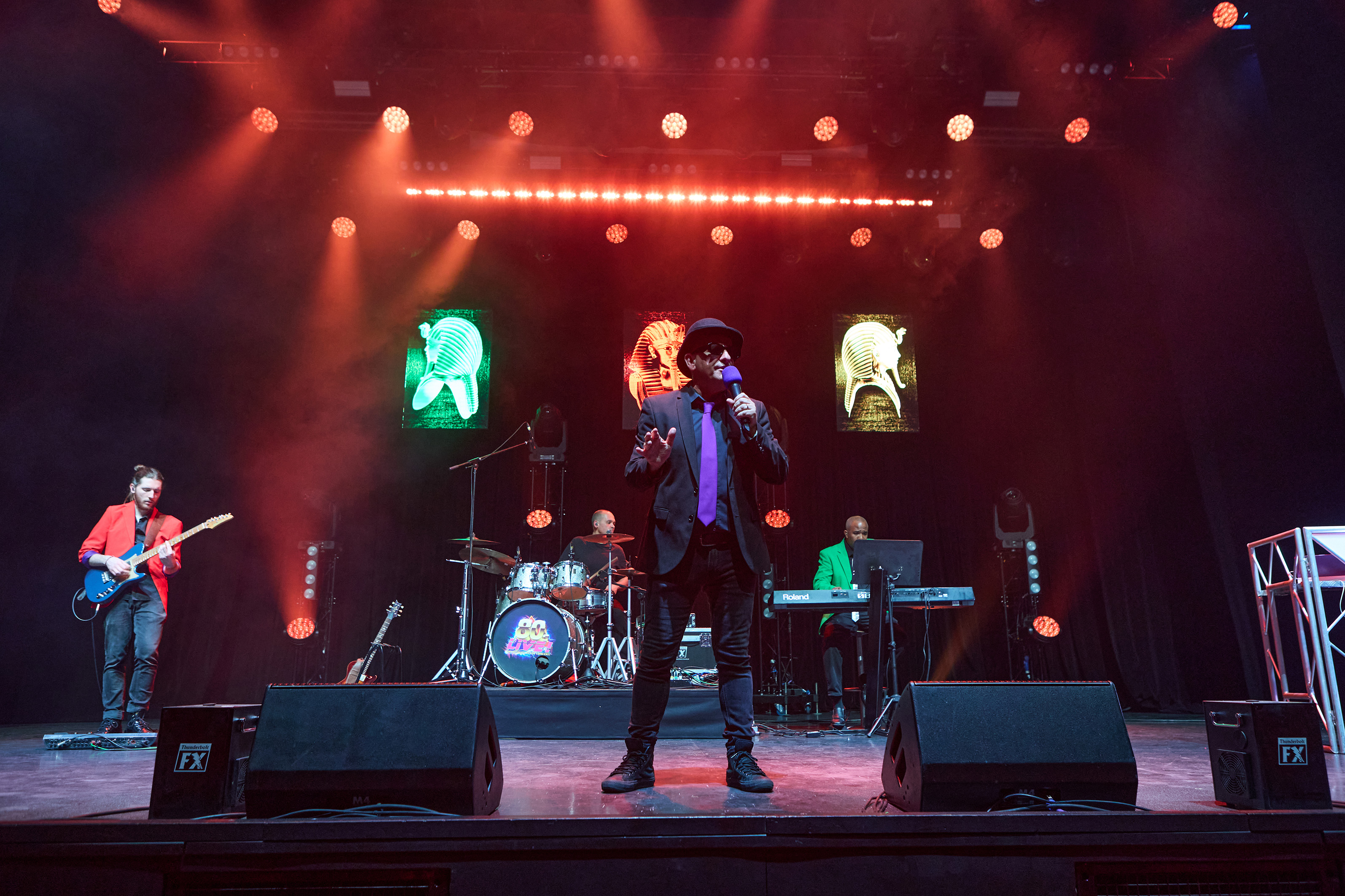 Singers on stage in front of an audience for the theatre show 80s Live coming soon to The Victoria Theatre Halifax