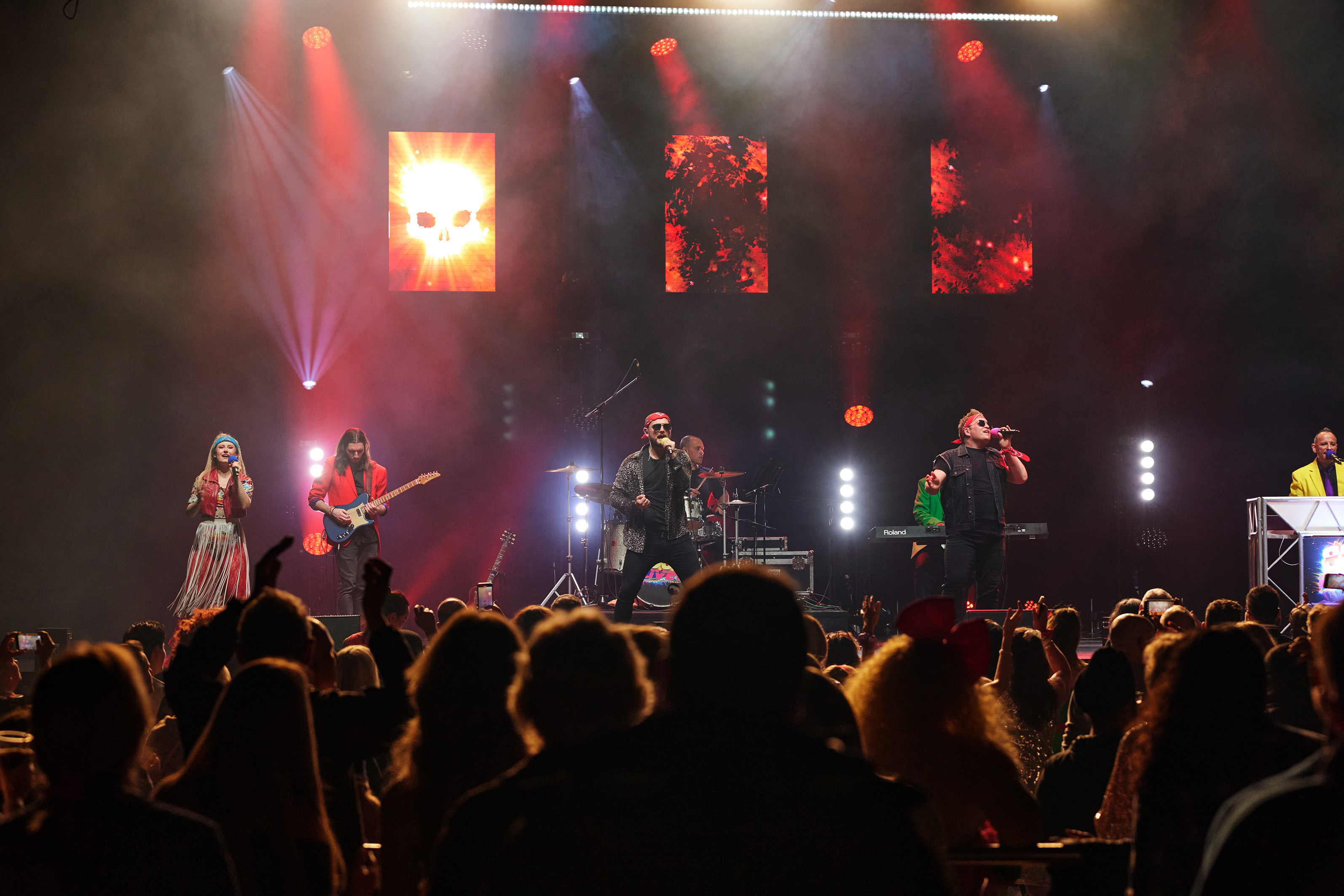 Singers on stage in front of an audience for the theatre show 80s Live coming soon to The Victoria Theatre Halifax