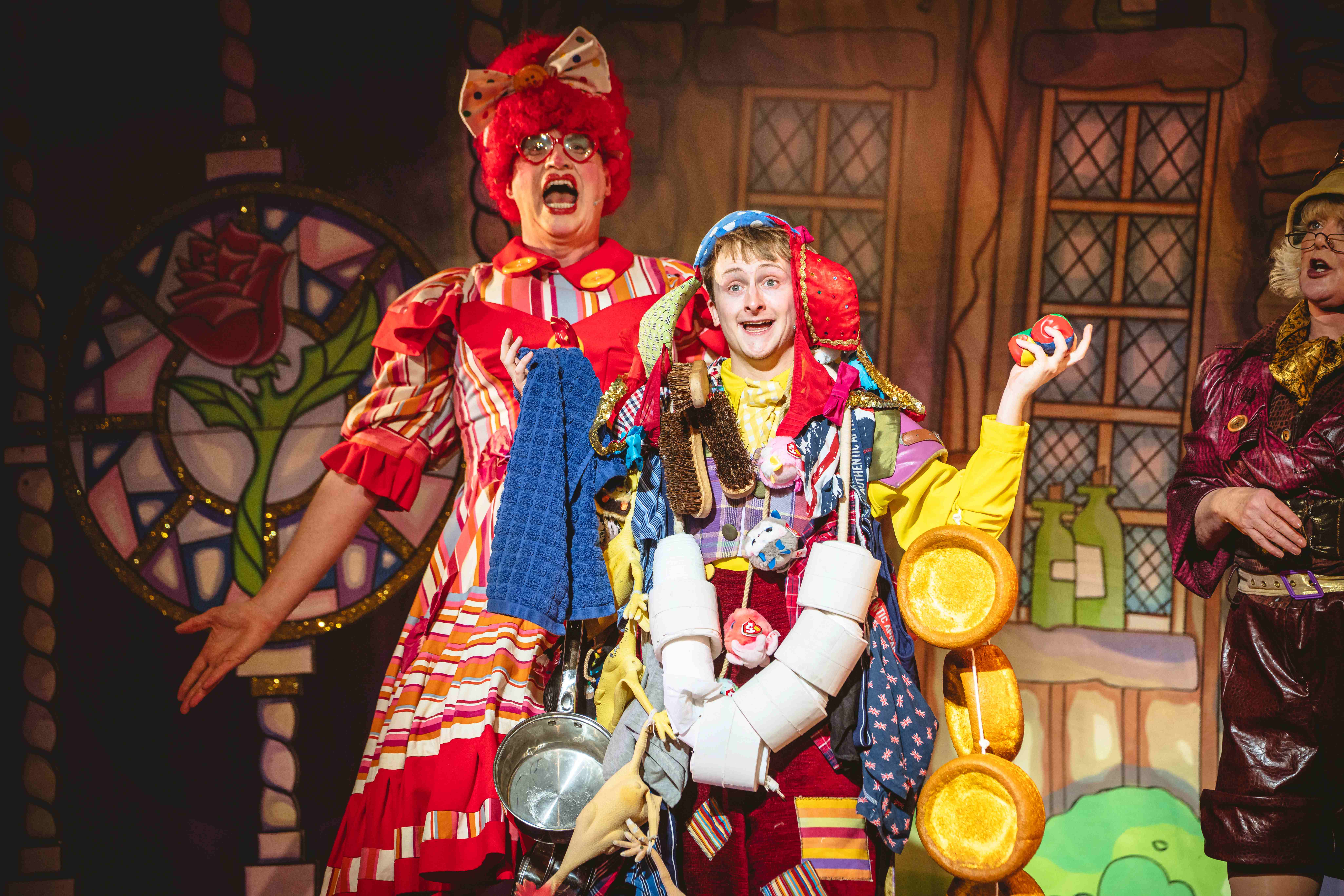 Aladdin Pantomime at the Victoria Theatre Halifax featuring 2 colourful characters, The Dame and Comic
