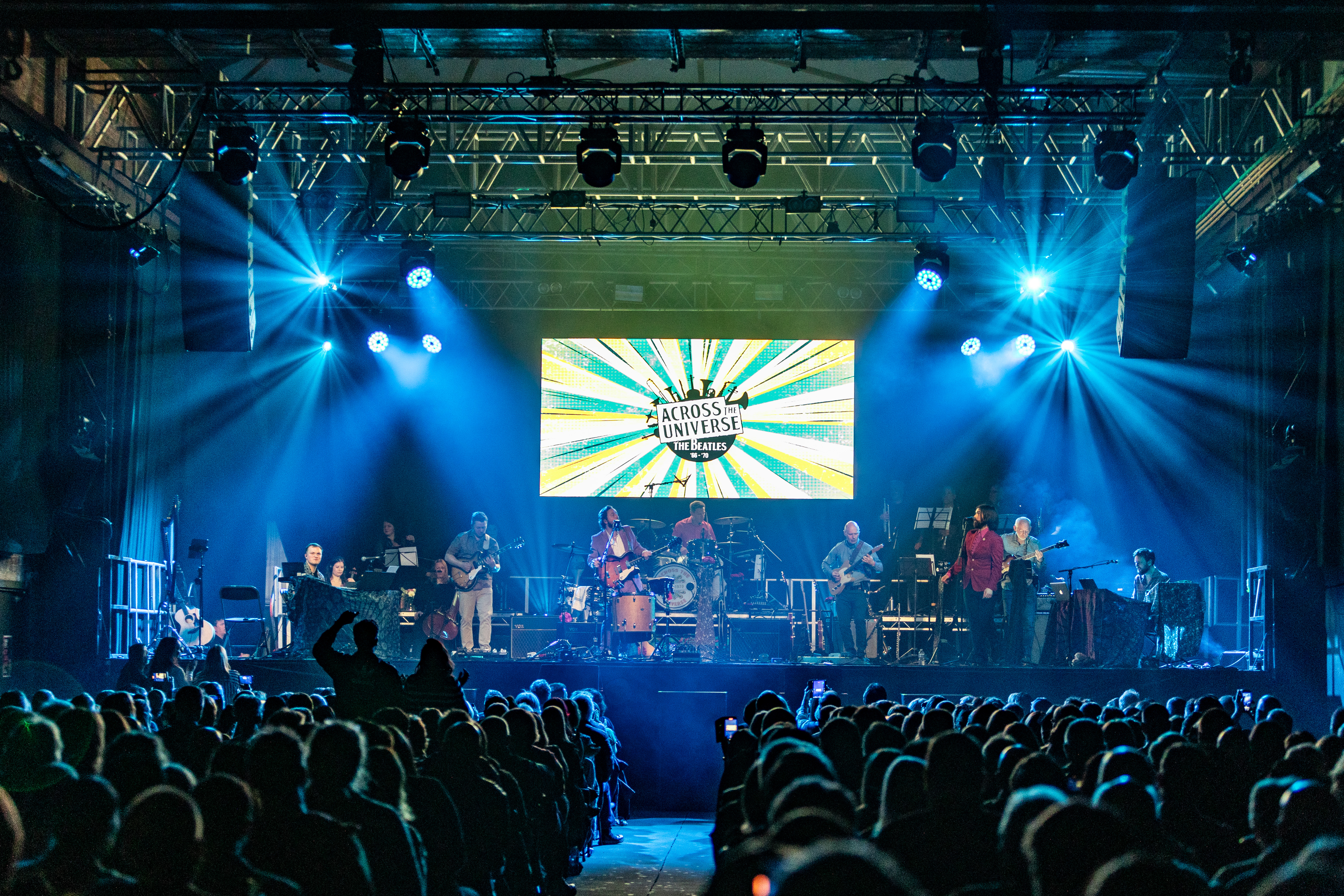 Across The Universe: The Beatles '66-'70 promotional image with band and orchestra at Victoria Theatre Halifax